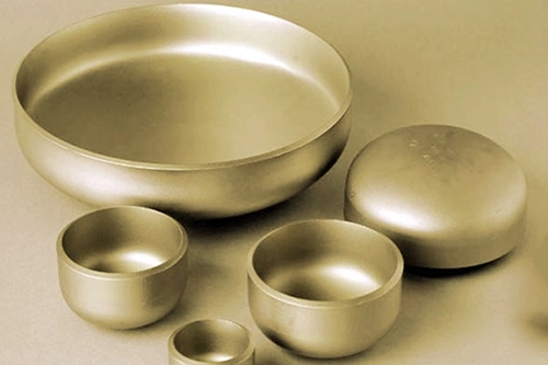 Copper nickel end caps for sealing marine piping systems